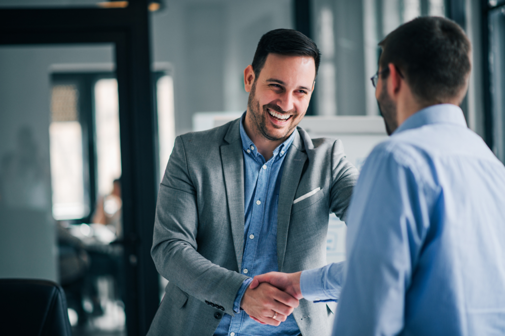 Why-clients-trust-us-two-men-shaking-hands
